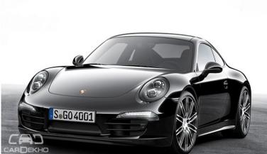 नई ब्लैक कलर स्कीम में आई Porsche Boxster और 911Carrera